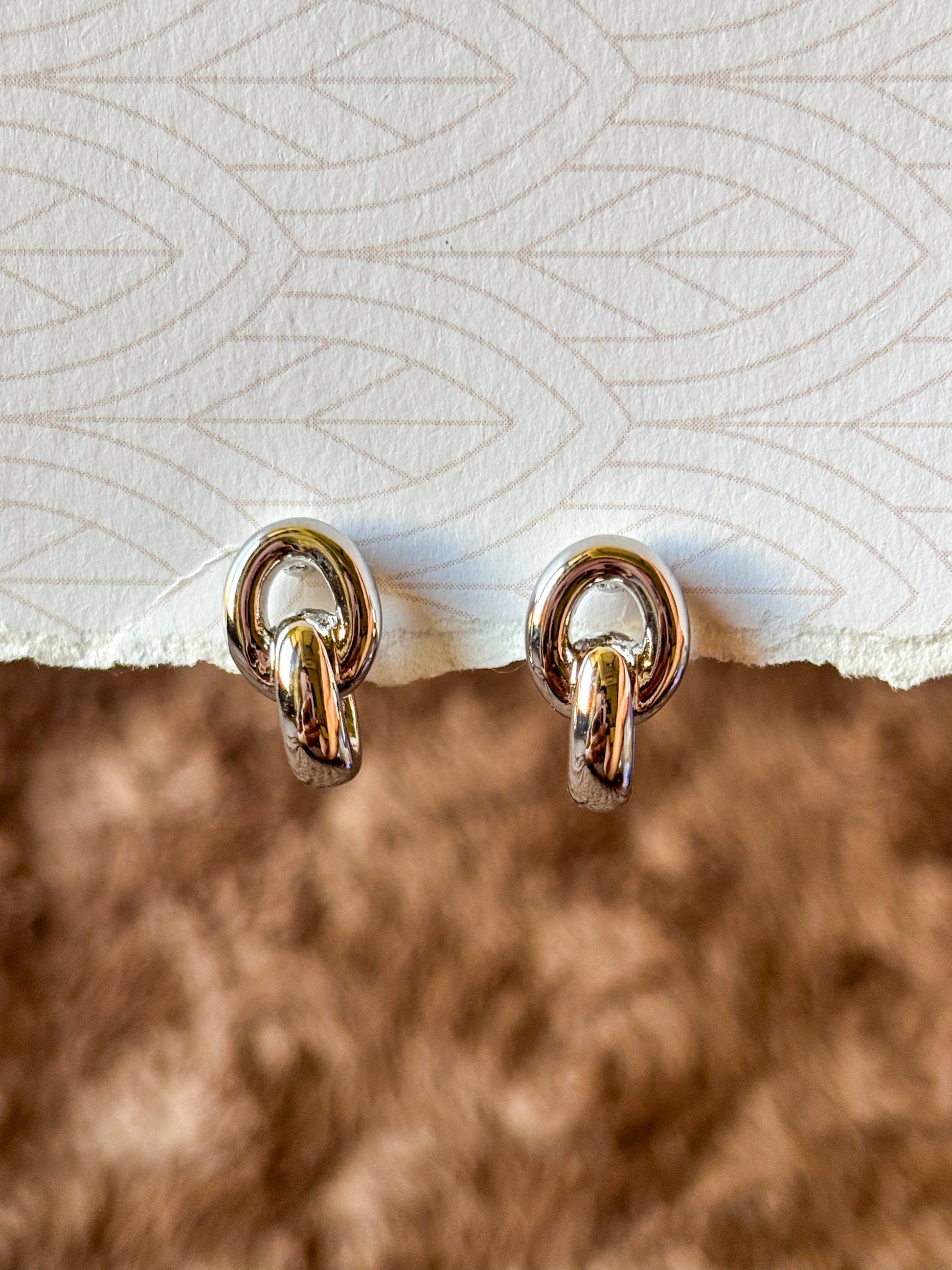 silver knot studs perfect for everyday wear.
