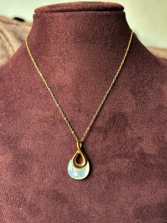 Elegant gold anti-tarnish necklace with a modern teardrop pendant featuring a pearl-inspired detail.